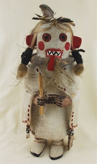 This Yohozro Wuhti Kachina was carved and signed by world-renowned Hopi carver Jimmy Kewanwytewa. She measures 11" tall by 4 1/2" wide. She is in excellent condition, with no cracks or broken parts.