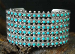 BEAUTIFUL ZUNI SNAKE EYE 6 ROW CUFF