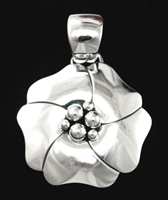 ARTIE YELLOWHORSE STERLING SILVER FLOWER PENDANT