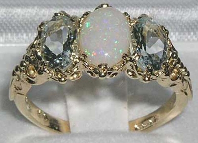 Exuberant 9K Yellow Gold Natural Australian Opal and Aquamarine Trilogy Ring