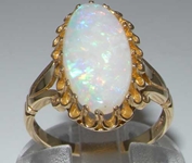 Exquisite 9K Yellow Gold Natural Australian Opal Solitaire