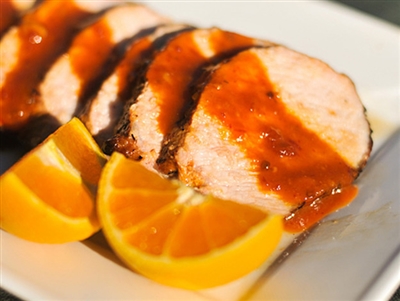 Grilled pork tenderloin with Spiced Orange Sauce