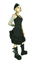 This Dress is done in our Pinstripe fabric and features an Adjustable Bustle, Layered Ruffles, and a Back Zipper and most importantly has 2 deep side pockets. Made of polyester pinstripe and has a 100% Polyester Lining. Gothic and Steampunk.