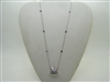 14k white gold purse necklace with blue sapphire stones
