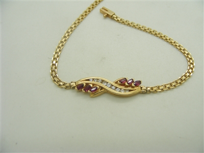 14k yellow gold woman's bracelet Diamonds and ruby's