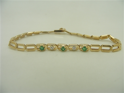 14k yellow gold diamond and emerald ladies bracelet
