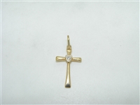 Diamond cross pendant with a heart