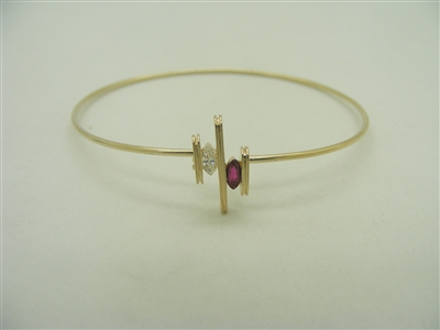 14k yellow gold designed piece diamond and ruby marquise bracelet