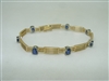 14k yellow gold light blue oval sapphire bracelet
