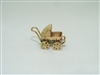 Vintage 14k yellow gold baby carriage charm