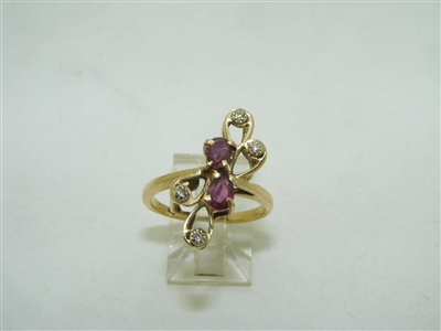 14k yellow gold pear shape ruby and diamond ring