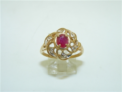 A Natural Diamond and Ruby Yellow Gold Ring
