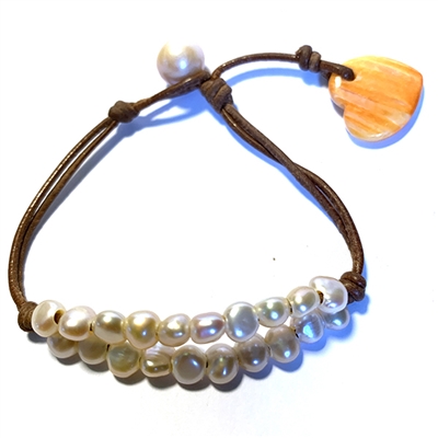 photo of Wendy Mignot Simba L'Amour Freshwater Pearl and Leather with Lions Paw Heart Bracelet