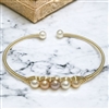 photo of Wendy Mignot Gaughin Petite Five Pearl Brass Bangle