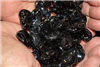 Odd irregular shaped black colored fire crystals