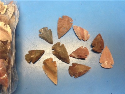 Mix agate arrowheads, natural stones of different variety of agate. Colorful display and variety