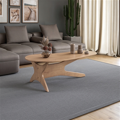 Mid-Century modern solid wood coffee table in clean light oak finish with abstract shaped top