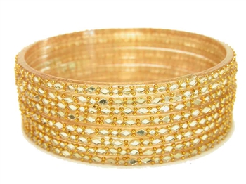 Gold glass bangles from our Prism Collection.