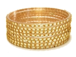 Gold glass bangles from our Prism Collection.