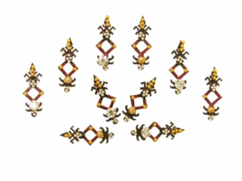 Unique bindi shape in black and red with gold silver and white crystals.