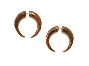 Small crescent shaped earrings are divided evenly in the center.