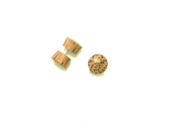 Tan coconut wood with dark brown streaks creat little leapord print dots on thes fake plugs.
