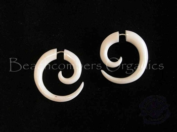 Organic bone earrings carved into a spiral less than 1" long.