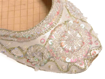 Indian shoes in warm white ivory silk with iridescent beads and sequins with gold threadwork.