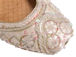 Warm white ivory silk with iridescent beads and sequins with gold threadwork.