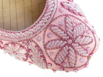 Light pink silk shoes with matching beads and sequins.