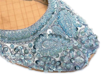 Light blue silk shoes with matching beads and sequins.