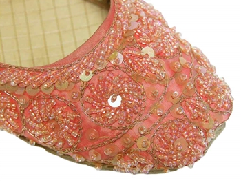 Shoes in bright salmon peach silk with matching beads and sequins.