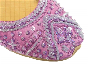 Lavender silk with matching beads and sequins make these shoes pretty.