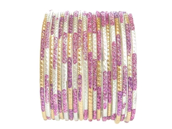 Matte gold and silver bangles with purple glitter accents.