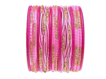 Magenta and pink bangles with gold glitter accents.