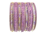 Lavender, purple, and gold glass bangles with glitter accents.