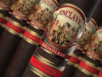 Pictured is a cigar with a band that has a horse and an indian on it, also has a red and gold band under it