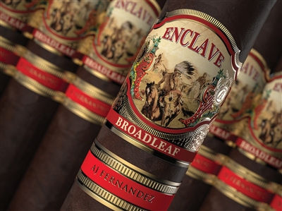 Pictured is a cigar with a band that has a horse and an indian on it, also has a red and gold band under it