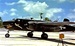 Photo of a 75mm equipped  North American B-25G Michell medium bomber from the 48th Bomb Squadron, 7th Army Air Force, on the runway on the Island of Apamama in the Gilbert Islands in World War 2
