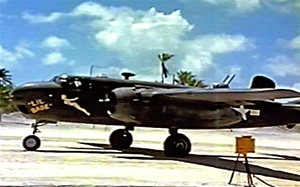 Photo of a 75mm equipped  North American B-25G Michell medium bomber from the 48th Bomb Squadron, 7th Army Air Force, on the runway on the Island of Apamama in the Gilbert Islands in World War 2