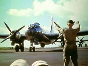 World War 2 color photo of Boeing B-29 Superfortress taxiing in after a mission.