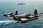 Color photo taken during World War 2 of  Vought F4U Corsairs in flight