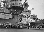 Photo of a Grumman F6F Hellcat fighter operating from the deck of the carrier USS Lexington during World War 2.
