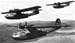 Photo of Black Cat PBY  Navy bombers on a night mission against Japanese shipping in the Pacific during World War 2.