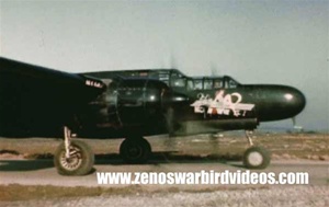 Color photo of a Northrop P-61 Black Widow night fighter ready to take off against Nazi Germany from a base in Belgium during World War 2.