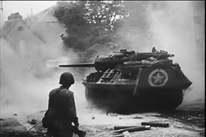 Photo of an M110 Tank Destroyer in action in Normandy during World War 2 from the Academy Award winning  documentary film, The True Glory.