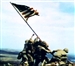 Marines raise the American flag atop Mount Suribachi on Iwo Jima