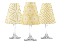 Set of 6 coordinating key, kaleidoscope and classic pattern translucent paper white wine glass shades by di Potter.  Made in the USA.