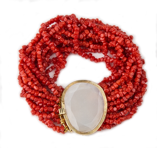 Multi-strand Red Coral designer Bracelet with a Moonstone Brooch at the closure. The faceted Gemstone is framed in 18K Yellow Gold and holds a locking clasp. Made in Italy by Mattio Mazza. Fits a 7" to 8" wrist.  Clasp with Moonstone is 1 3/8" L X 1 1/8W