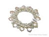 A stunning White Sapphire & Pearl Bracelet by Silver Pansy. Hand crafted in the U.S., this designer Bracelet features lustrous White Fresh Water Coin Pearls, mixed with Keshi Pearls & White Sapphire Gemstones. 925 Sterling Silver with a Toggle clasp.